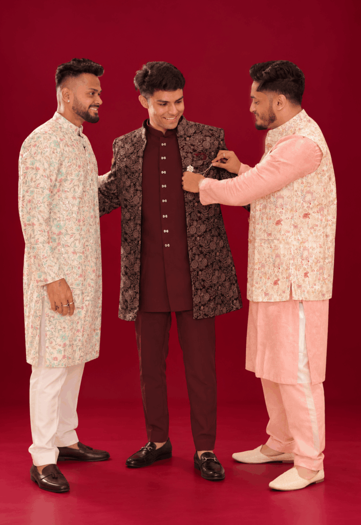 burgundy sherwani groomsmen portrait